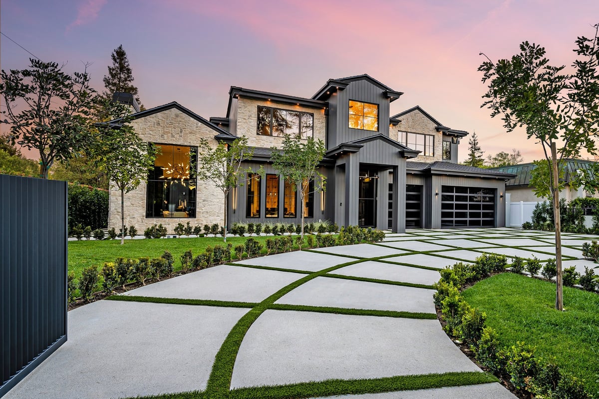 A modern home exterior with fresh finishes and clean landscaping